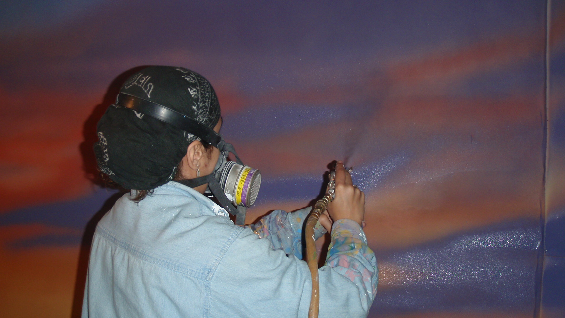 Murals painted on canvas and mounted onto the wall at the It'll Do Saloon in Corpus Christi, Texas.